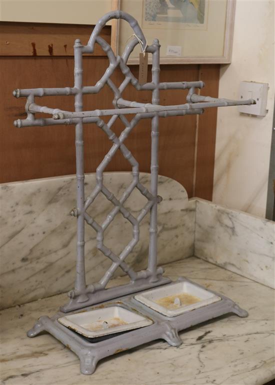 An enamelled faux bamboo cast iron stick stand W.51cm
